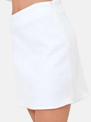 Mini-jupe blanche effet bouclé