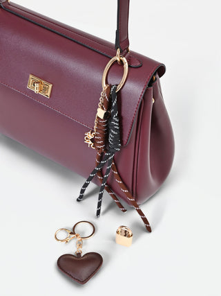 Bordeaux handbag with Giorgia Palmas X Rinascimento scarf
