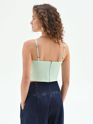 Mint green crop top with a decorative buckle