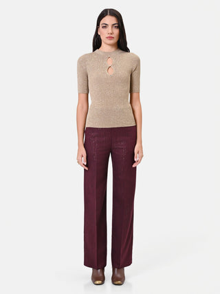Maglia in viscosa oro con cut-out e bottoni gioiello