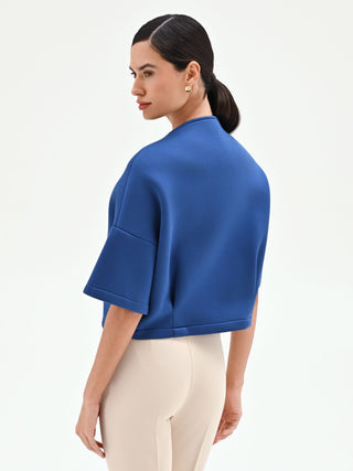 Cropped Jacke in leuchtendem Blau mit goldenen Zippern