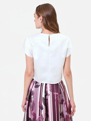 Blusa panna con maniche a risvolto