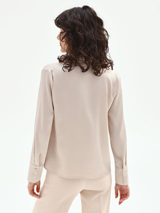 Light beige blouse with plissé detail