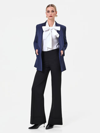 Pantalone nero a vita alta con maxi risvolto