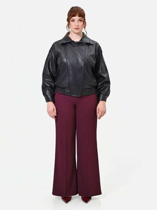 Giacca Curvy  in similpelle nera con chiusura asimmetrica