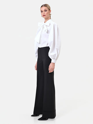 Pantalone nero a vita alta con maxi risvolto