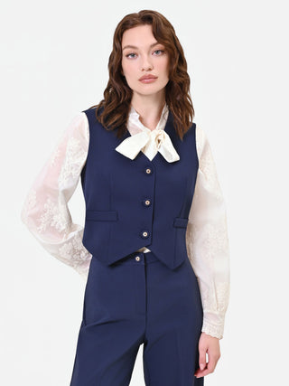 Gilet blu con bottoni gioiello