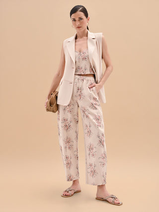 Pantalone rosa in denim stampa floreale