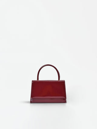Borsa a manu in vernice bordeaux