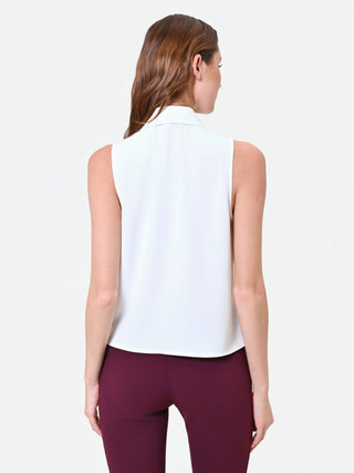 Sleeveless White Top with Ruffle and Jewel Detail