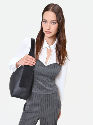 Blusa grigia con bustier gessato e paillettes