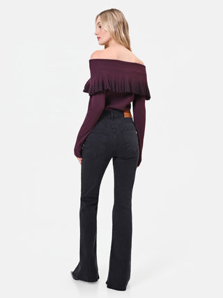 Jeans flare neri con spacchi frontali