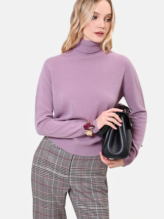 Maglia dolcevita rosa con bordi a costine