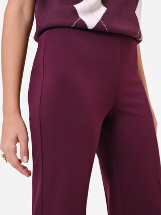 Pantalone a palazzo bordeaux con piega centrale