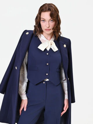 Gilet blu con bottoni gioiello
