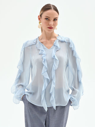Blusa azzurro cielo con rouches