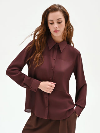 Schokobraune Bluse mit geometrischen Einsätzen