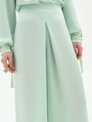 Pantalone palazzo verde menta con spacco frontale