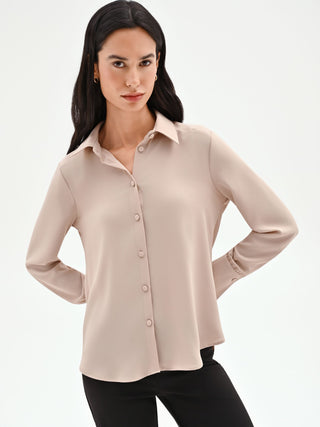 Beige shirt with covered buttons