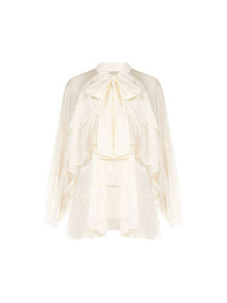 Blusa in lyocell avorio con balze e fiocco